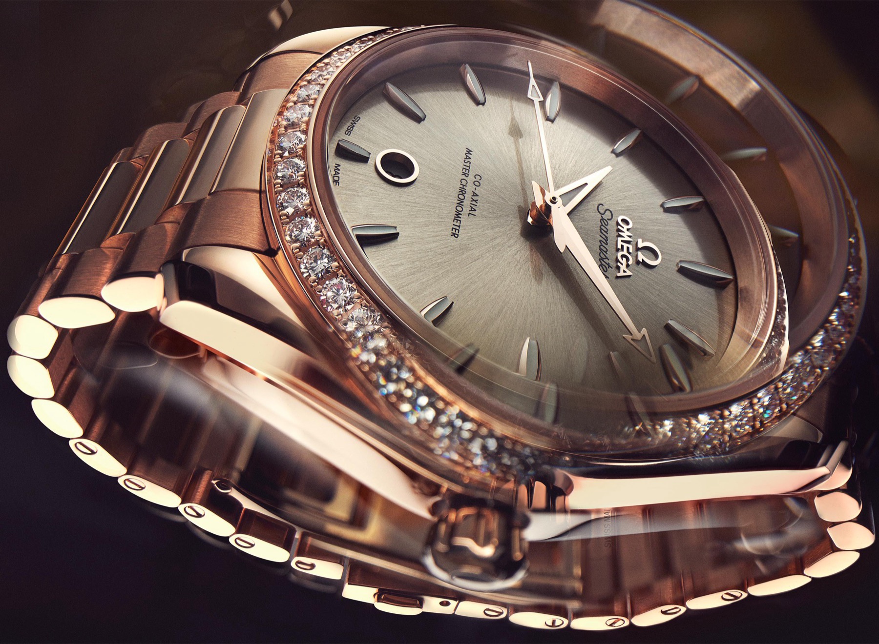 Watch macro, hard light across polished steel